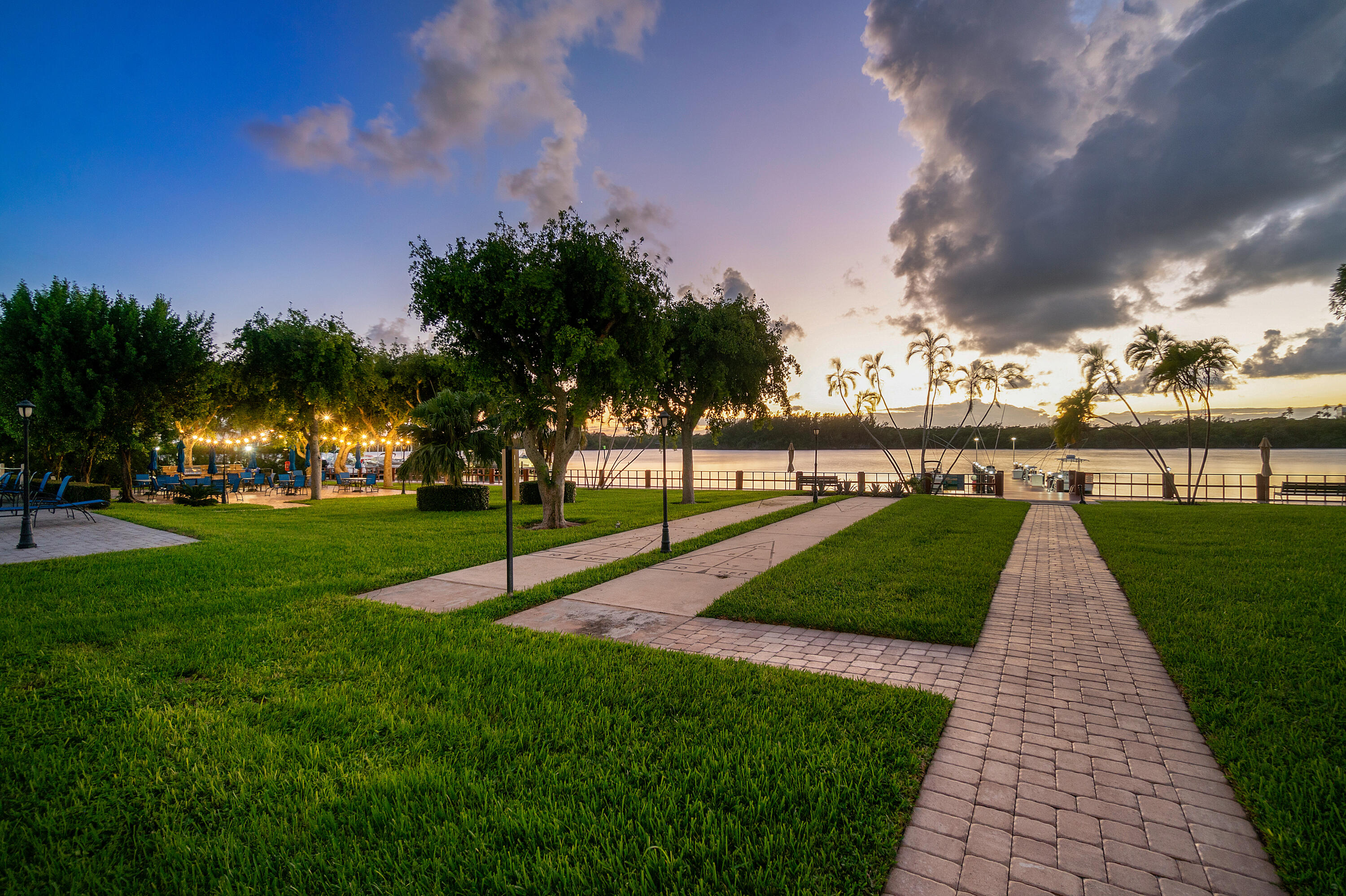 2121 North Ocean Boulevard, Unit 806W Boca Raton, FL 33431 - Photo 48 of 63 a park with lots of swings and slides