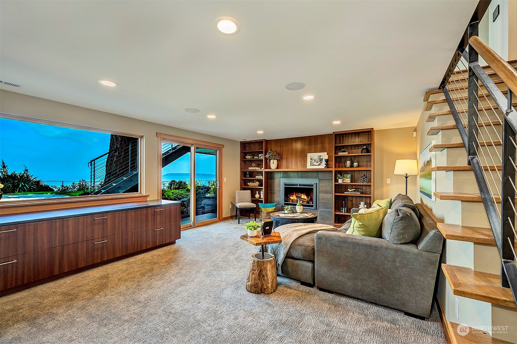 16902 Talbot Road Edmonds, WA 98026 - Photo 21 of 38 a living room with furniture and a fireplace