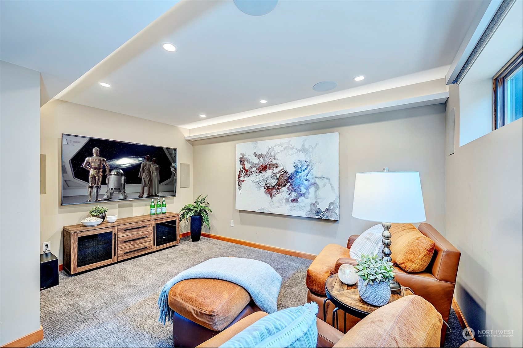16902 Talbot Road Edmonds, WA 98026 - Photo 23 of 38 a living room with furniture and a flat screen tv