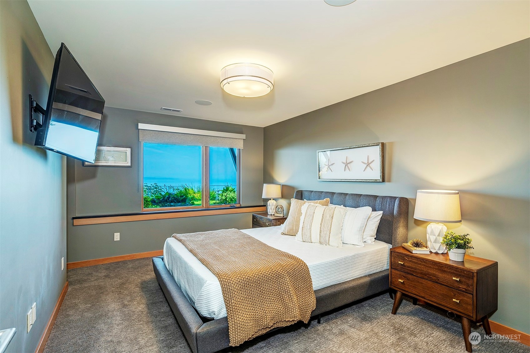 16902 Talbot Road Edmonds, WA 98026 - Photo 26 of 38 a bed room with a bed and a night stand