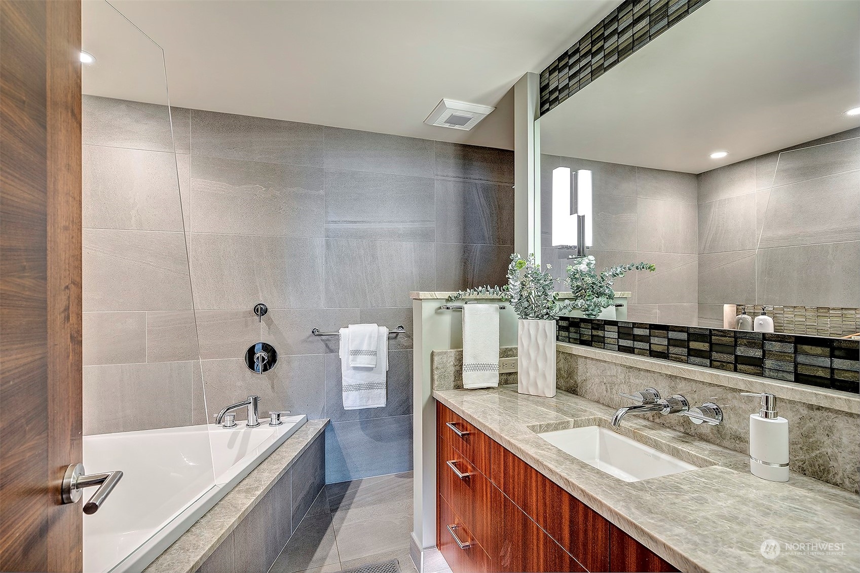 16902 Talbot Road Edmonds, WA 98026 - Photo 27 of 38 a bathroom with a granite countertop tub sink and mirror