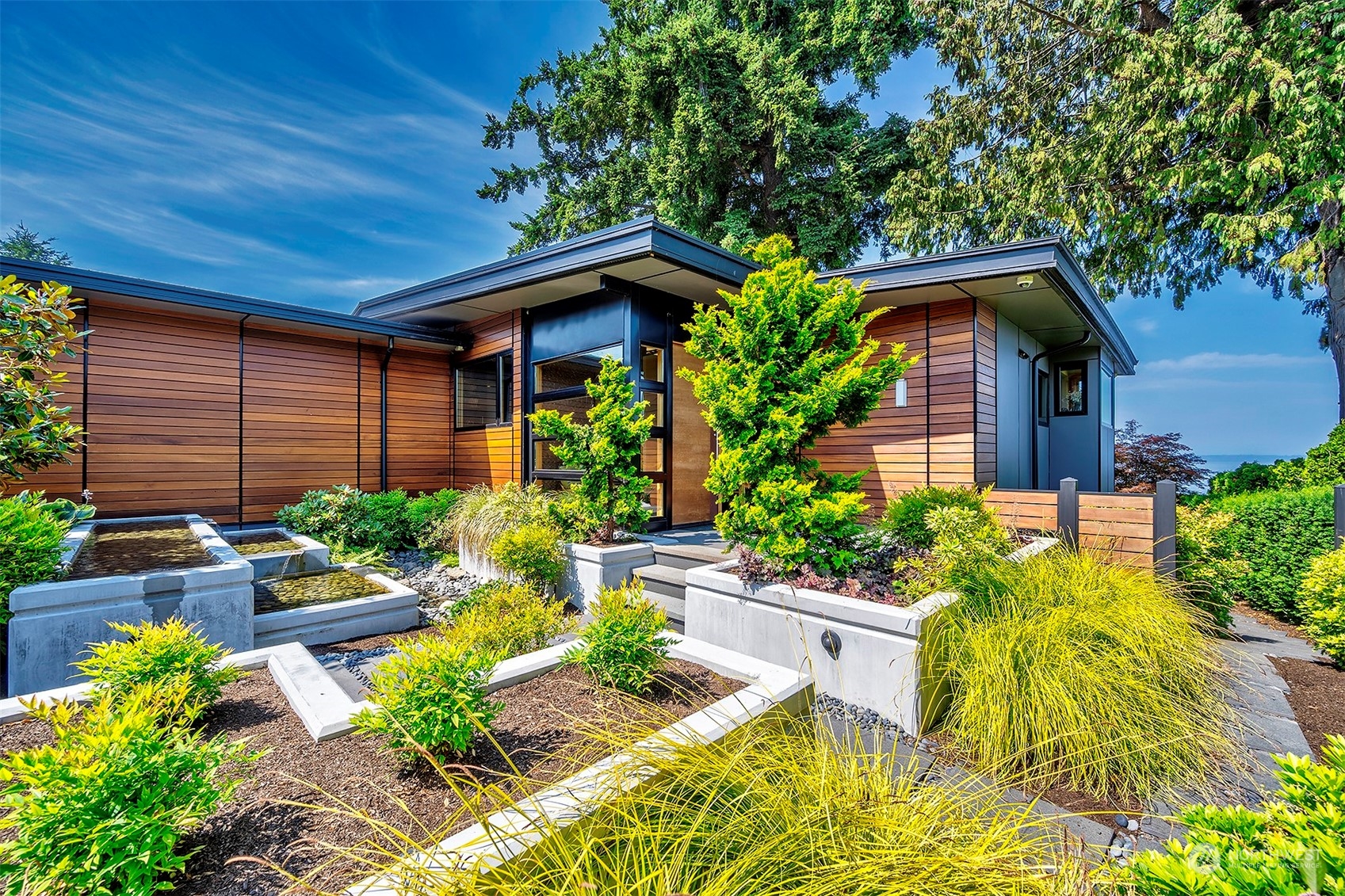 16902 Talbot Road Edmonds, WA 98026 - Photo 35 of 38 a front view of a house with garden