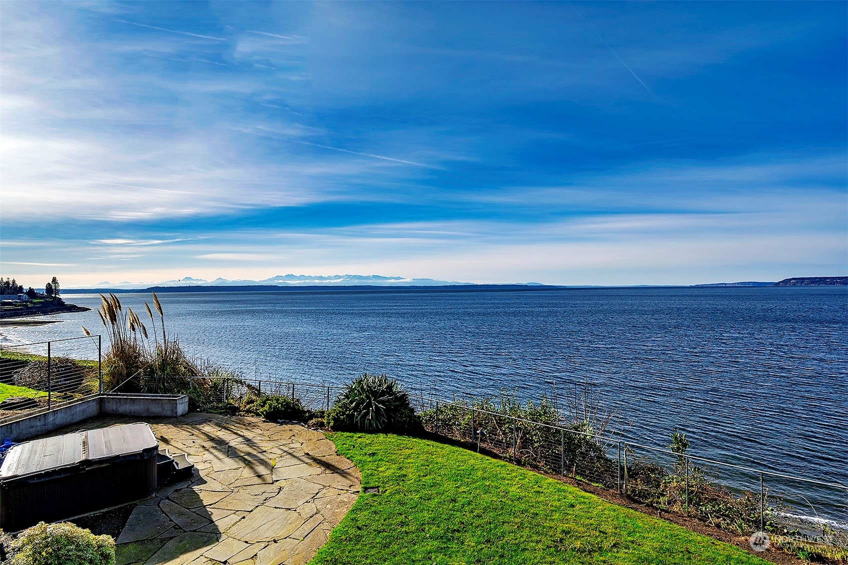 16902 Talbot Road Edmonds, WA 98026 - Photo 5 of 38 a view of a backyard with an ocean view