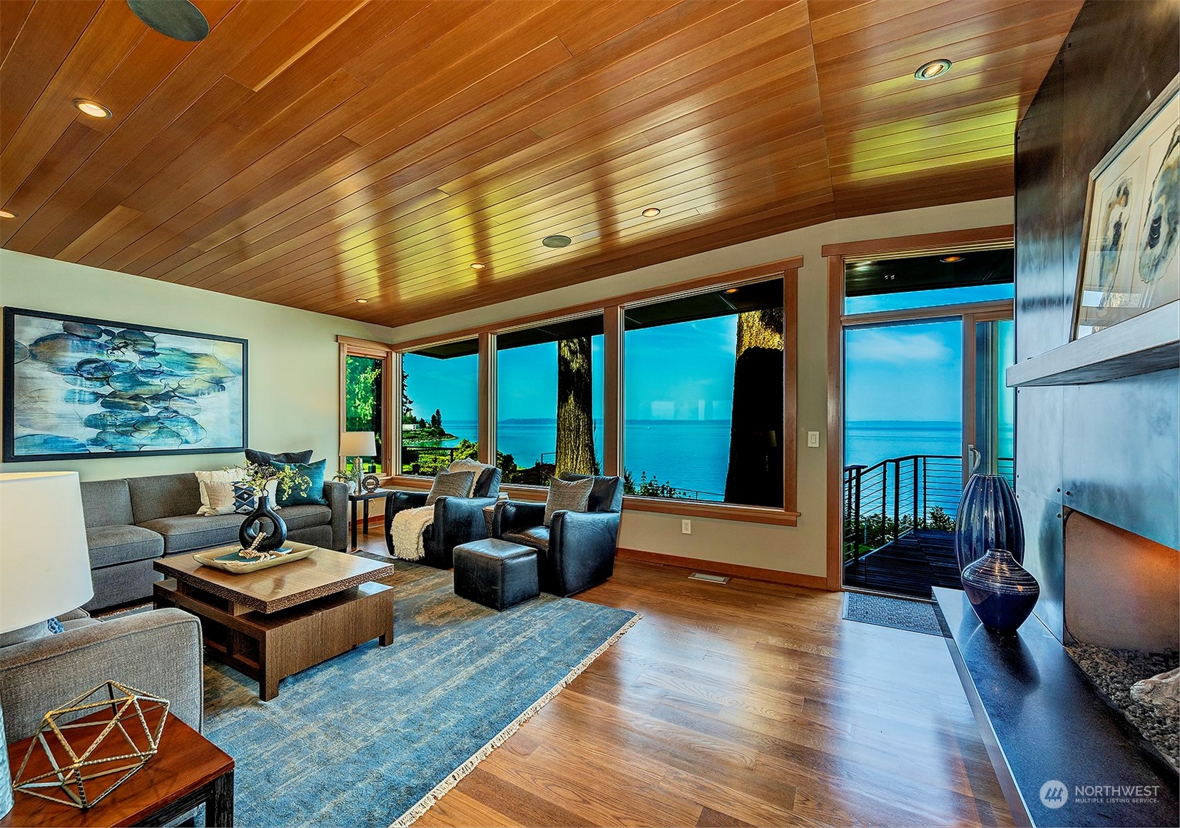 16902 Talbot Road Edmonds, WA 98026 - Photo 7 of 38 a living room with furniture floor to ceiling window and wooden floor