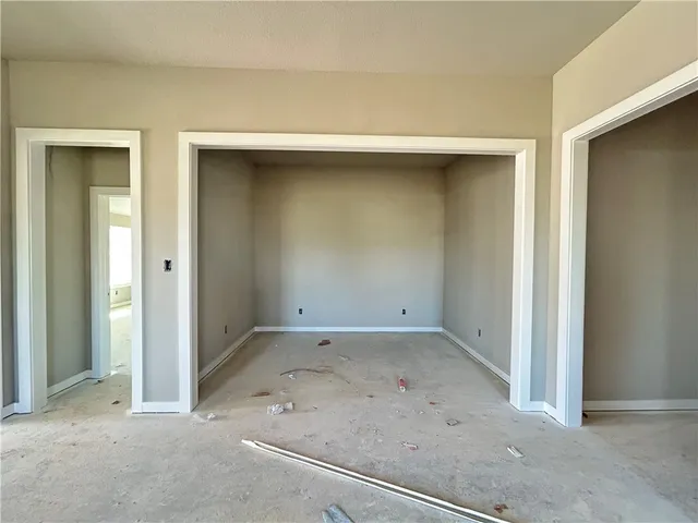 an empty room with a bench