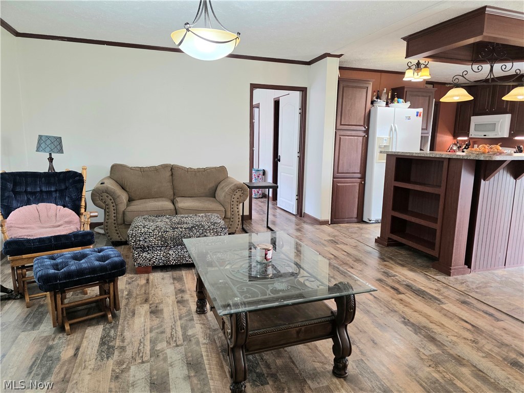 44 Scarce Fat Road Mineral Wells, WV 26150 - Photo 11 of 26 View of living room with access to kitchen and master bedroom
