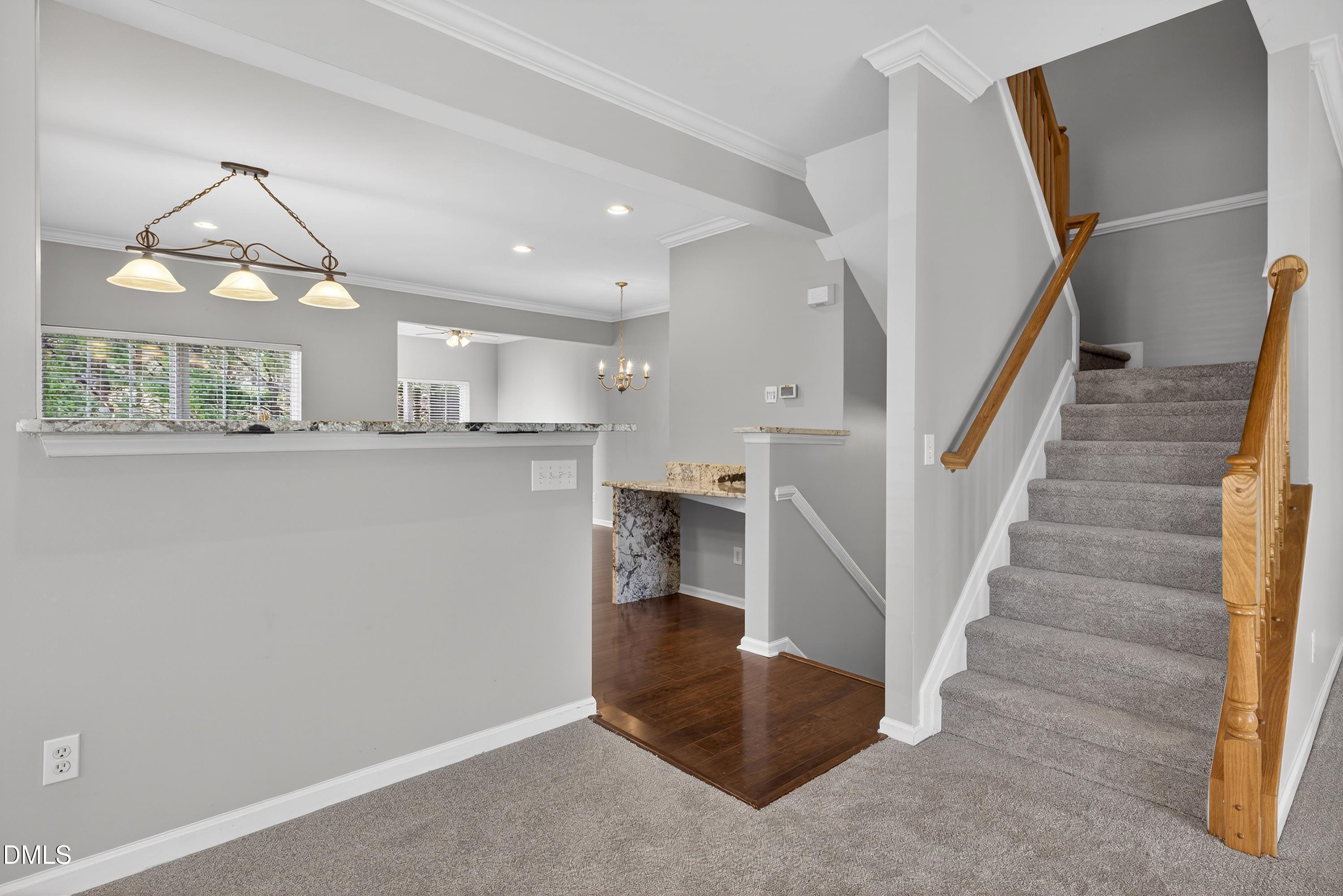 11830 Canemount Street Raleigh, NC 27614 - Photo 55 of 79 Stairs leading to 3rd floor Primary Suite and Bedrooms!