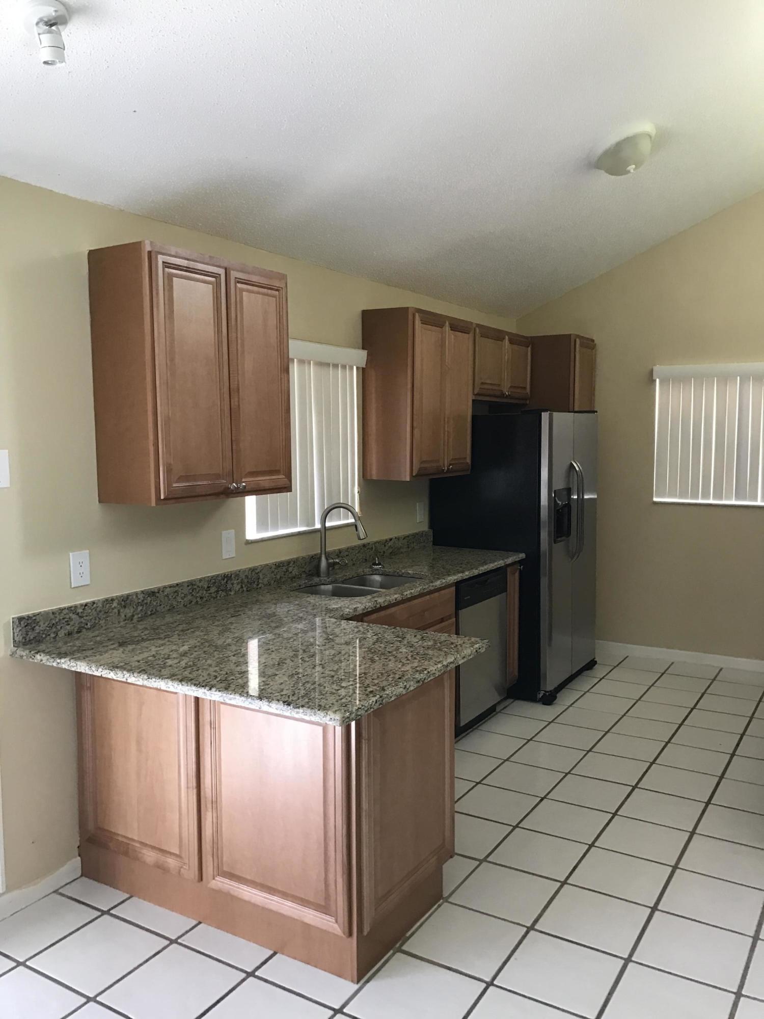 72 Maplecrest Circle Jupiter, FL 33458 - Photo 3 of 22 IMG_1145