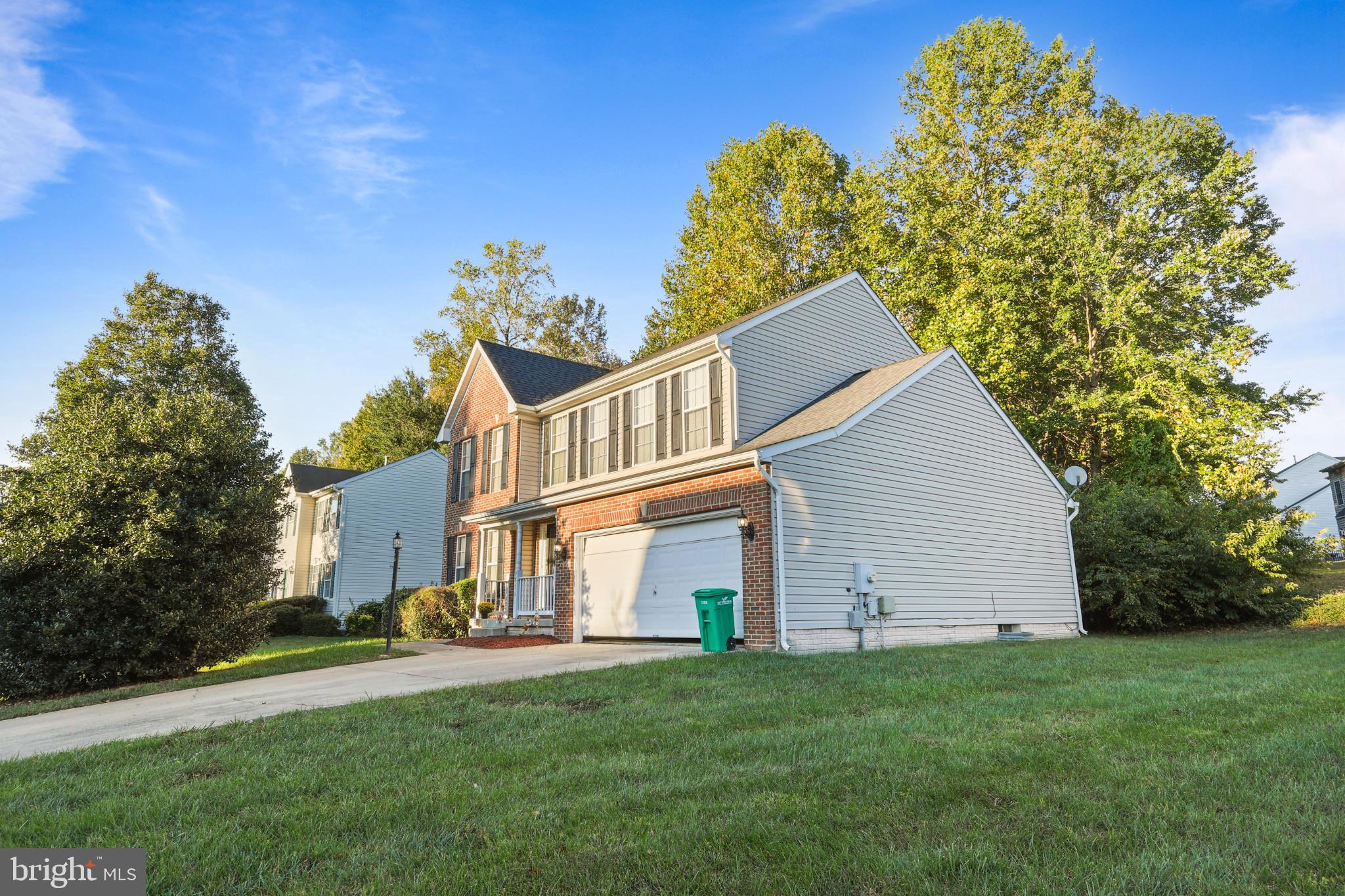 9716 Penguin Place Upper Marlboro, MD 20772 - Photo 1 of 84 a front view of a house with a garden