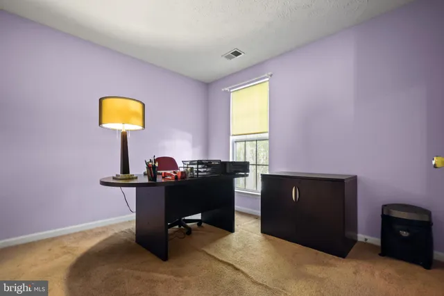 a bathroom with bathtub and shower