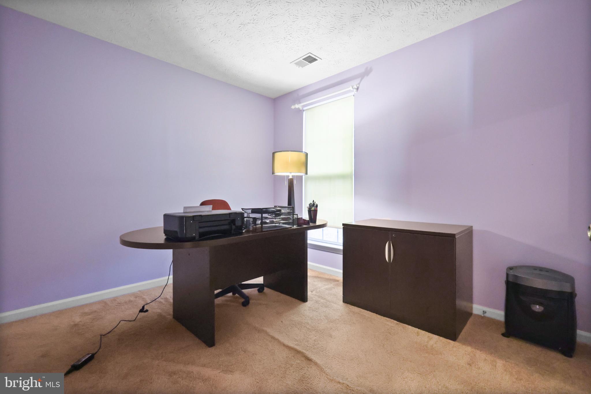 9716 Penguin Place Upper Marlboro, MD 20772 - Photo 30 of 84 Serene purple office space for productivity.