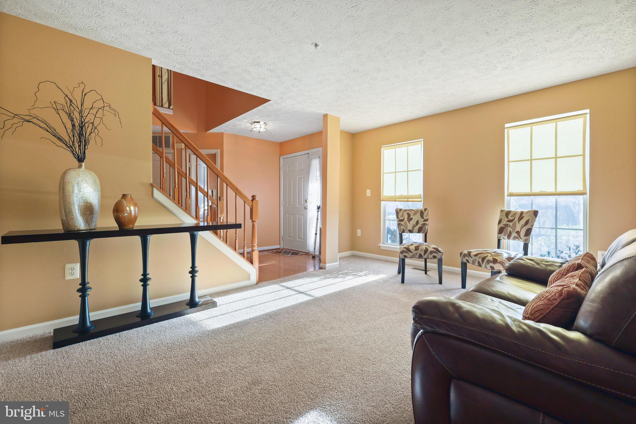 9716 Penguin Place Upper Marlboro, MD 20772 - Photo 66 of 84 a living room with furniture and windows