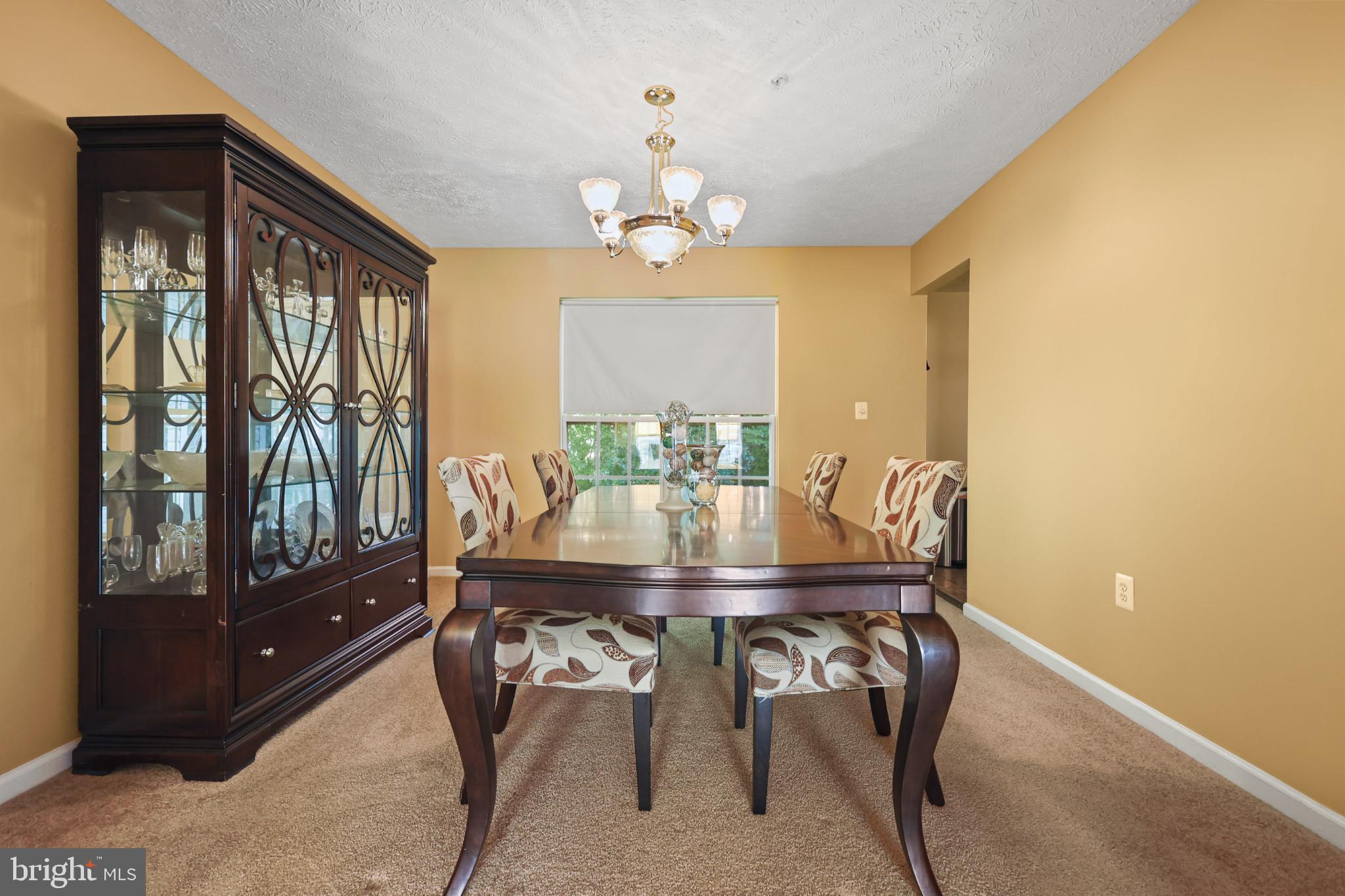 9716 Penguin Place Upper Marlboro, MD 20772 - Photo 71 of 84 a view of a dining room with furniture window and outside view