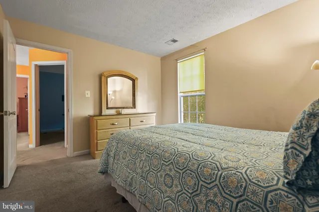 a view of a hallway view with staircase