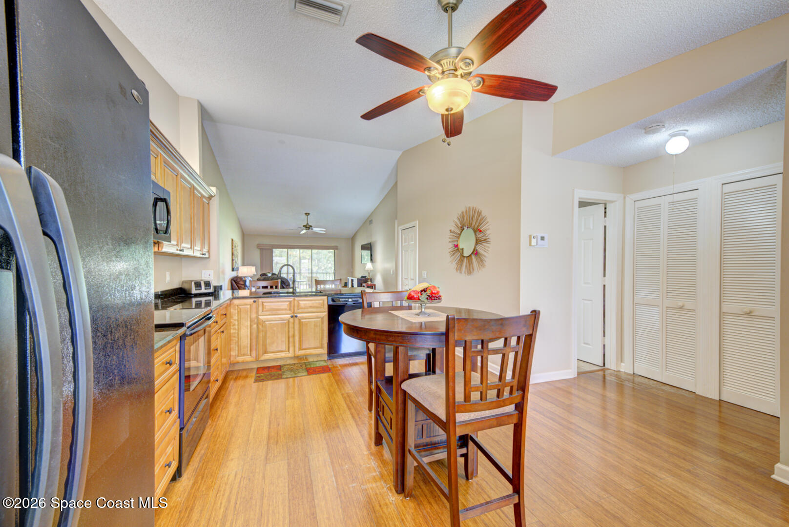 1142 Keystone Drive, Unit F Jupiter, FL 33458 - Photo 7 of 43 kitchen with vaulted ceiling