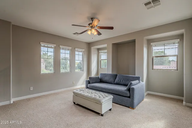 a bathroom with a tub sink shower