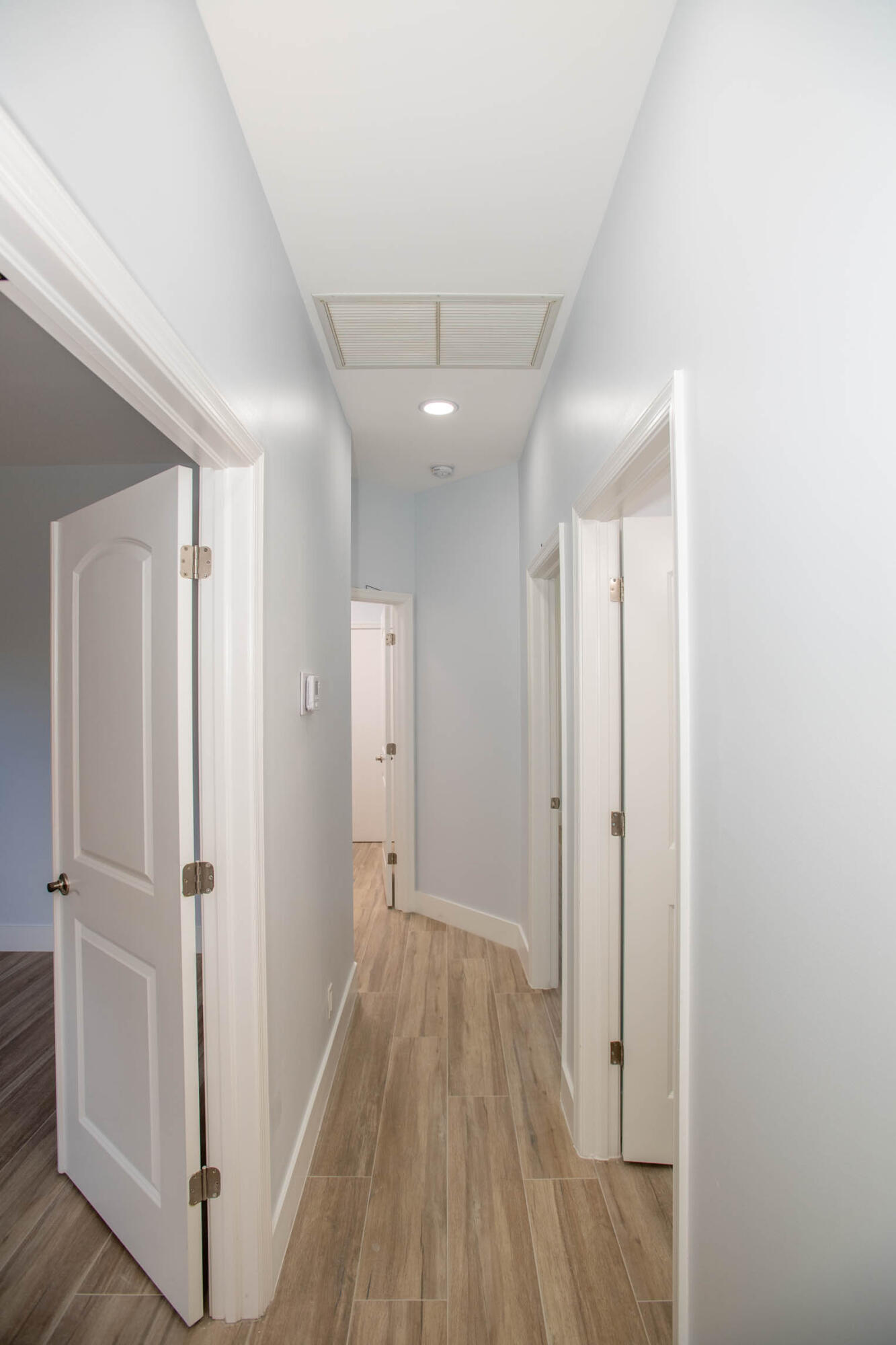 6656 Northwest 25th Way Boca Raton, FL 33496 - Photo 20 of 31 Hallway to 2nd/3rd bedroom