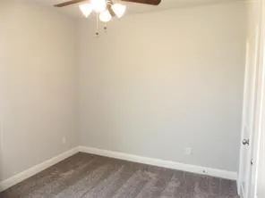 a view of a small space with fan