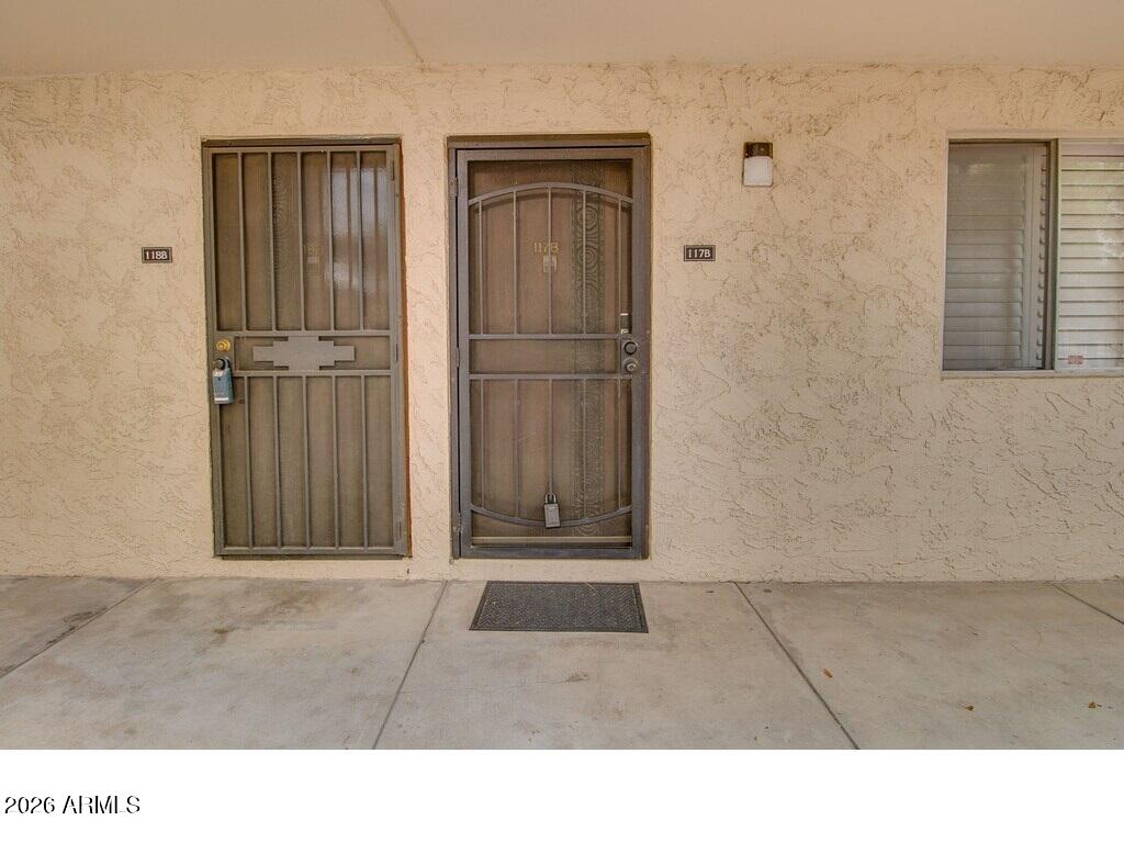 7625 East Camelback Road, Unit B117 Scottsdale, AZ 85251 - Photo 25 of 27 a black and white photo of a house