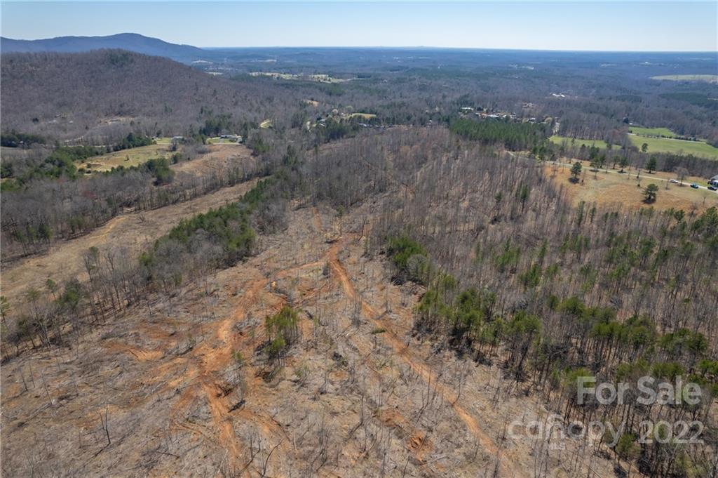 0 Waters Road Bostic, NC 28018 - Photo 11 of 48 a view of a town with mountains in the background