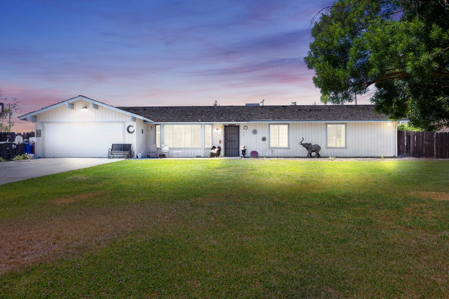 a house view with a garden space