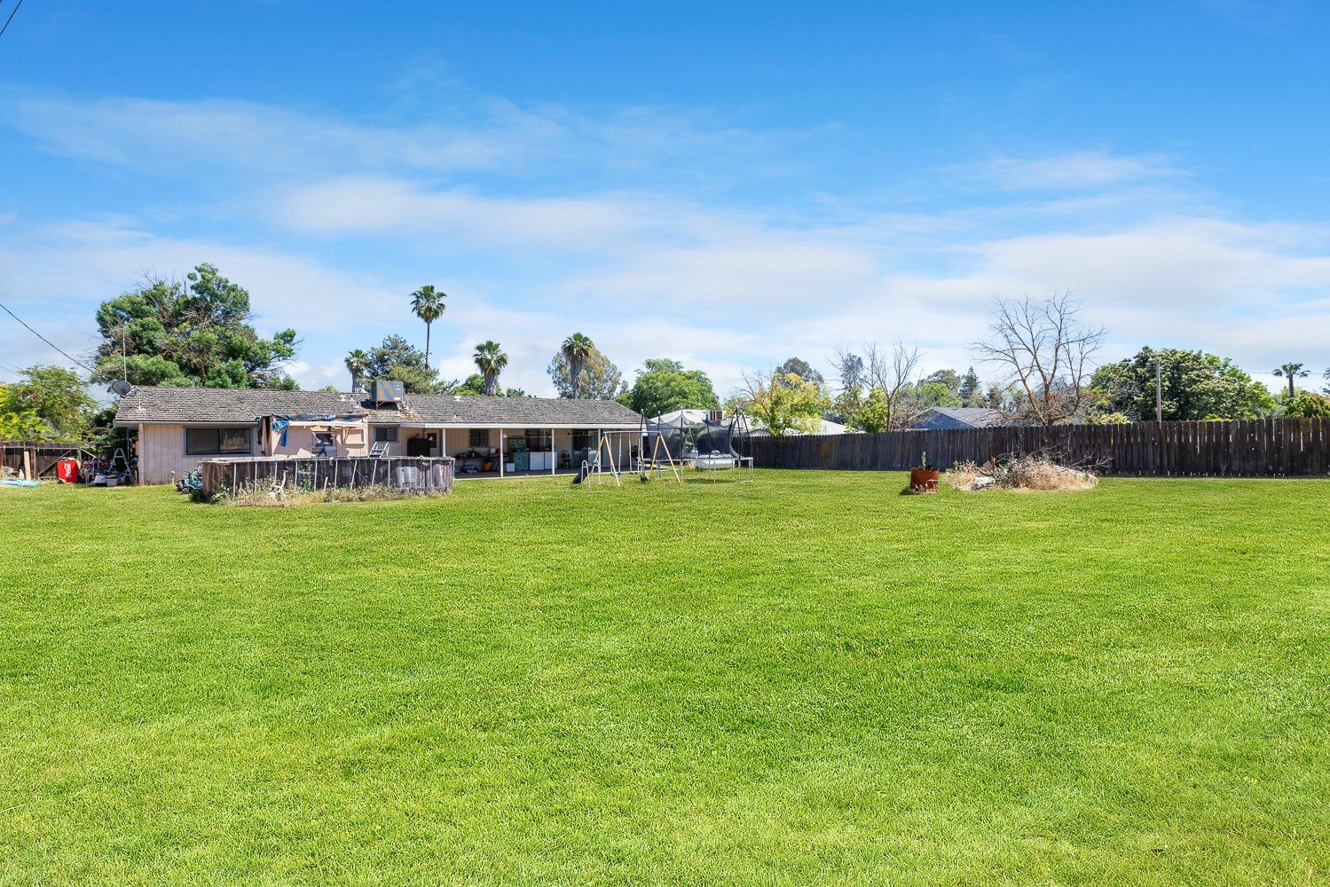 18800 Midland Way Madera, CA 93638 - Photo 23 of 27 a view of a house with a big yard
