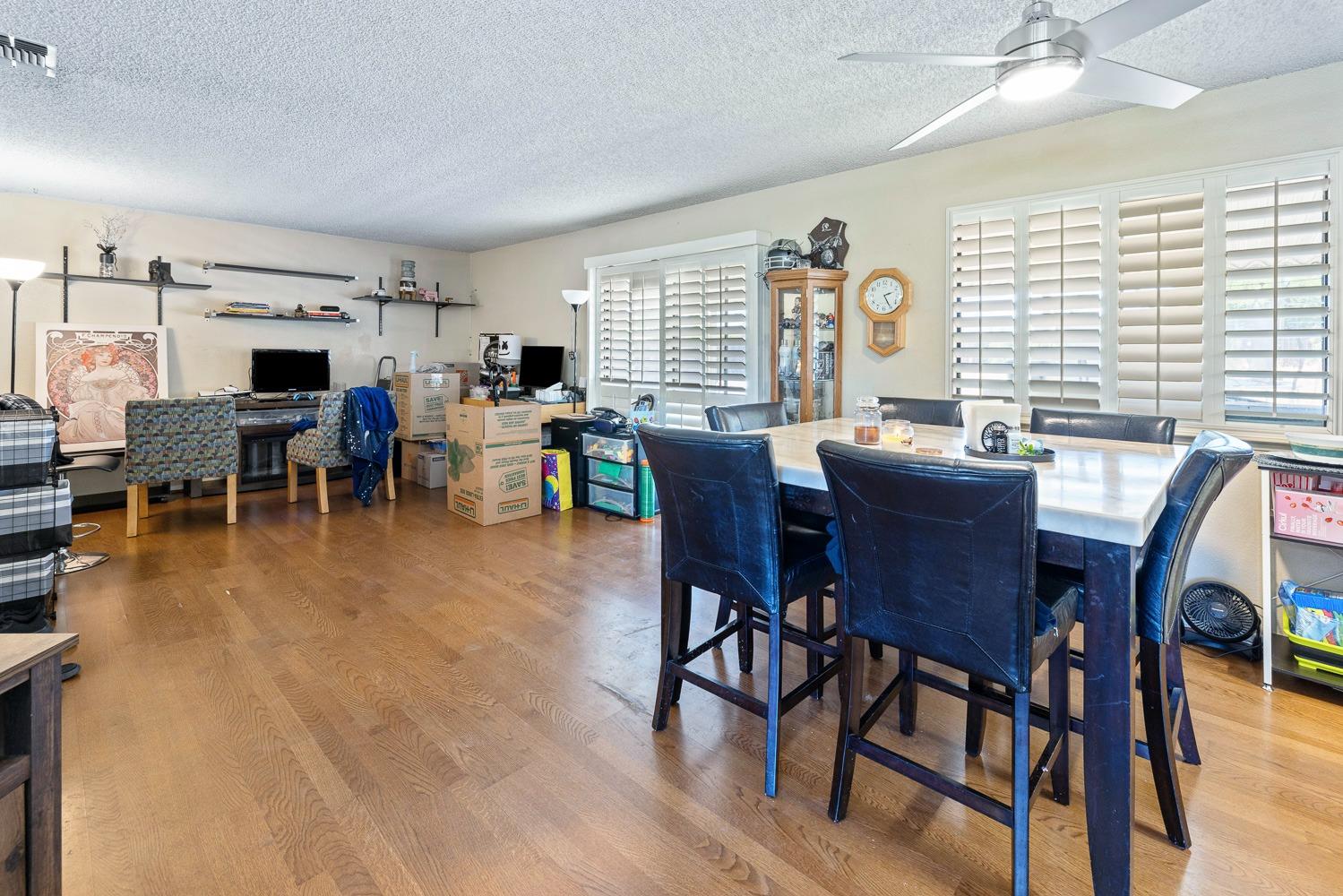 18800 Midland Way Madera, CA 93638 - Photo 8 of 27 a view of a dining room with furniture window and outside view