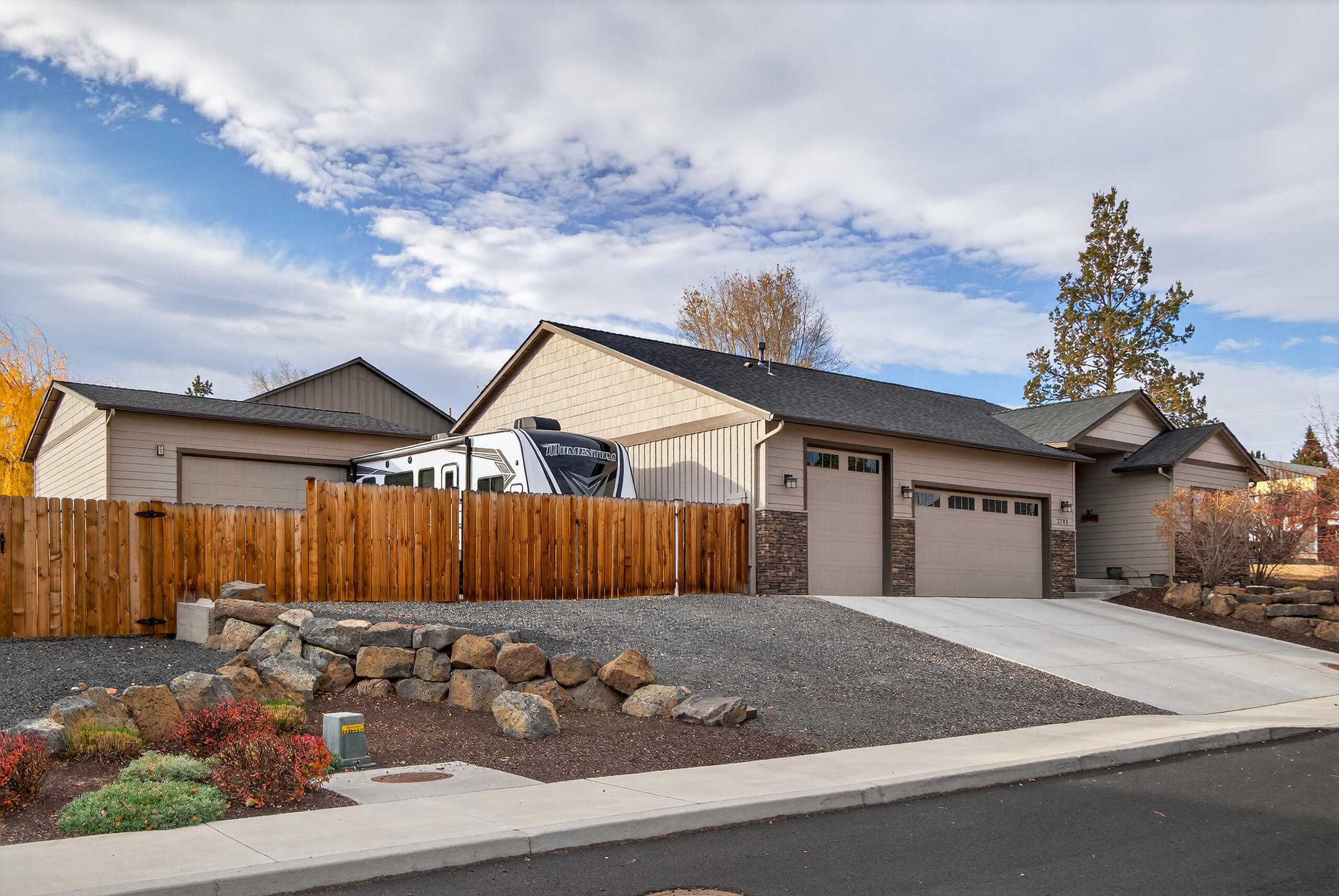 2793 Southwest 33rd Street Redmond, OR 97756 - Photo 1 of 44 a view of a white house with a yard