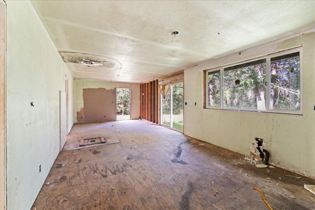 2787 Davis Creek Road Selma, OR 97538 - Photo 13 of 22 a view of a hallway with a workspace
