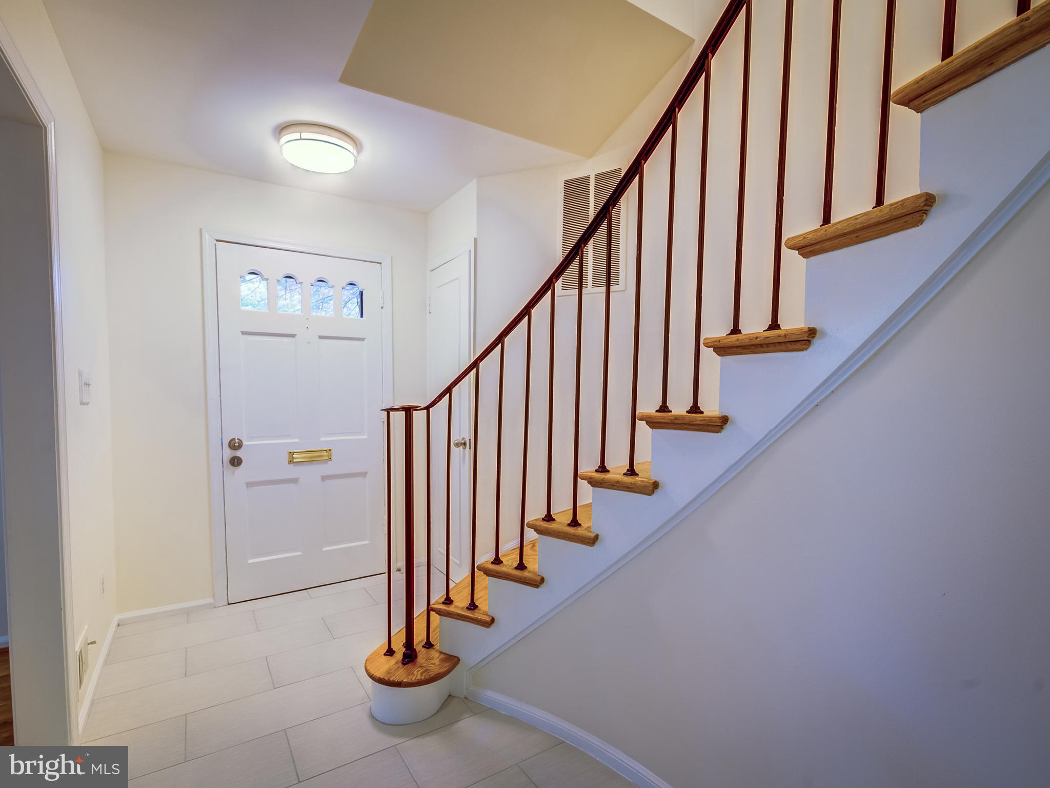 5951 Queenston Street Springfield, VA 22152 - Photo 4 of 30 Entrance foyer- Spiral staircase