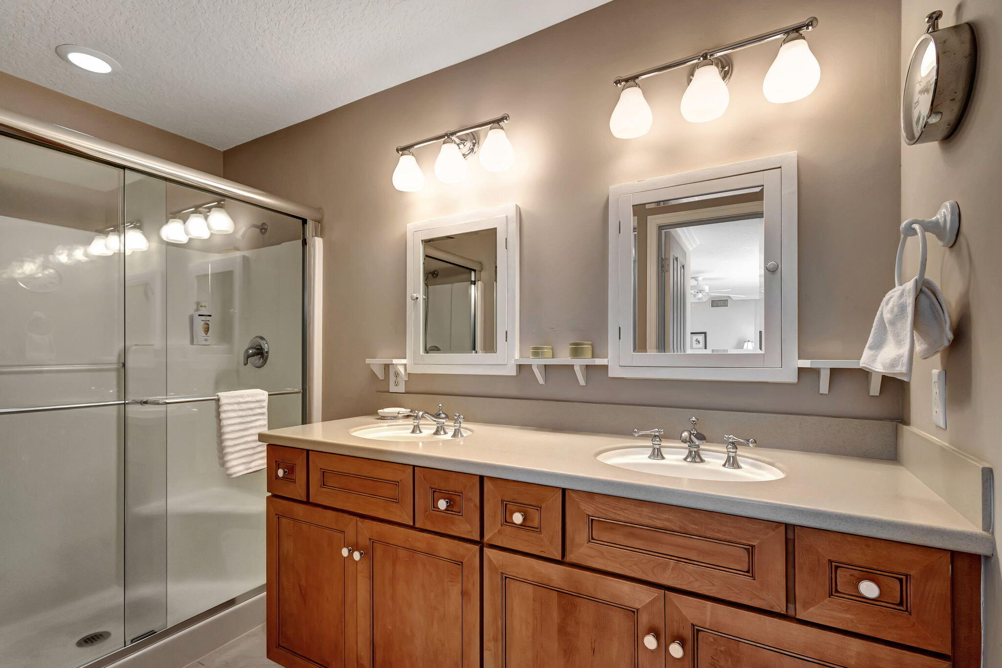 1420 Ocean Way, Unit 23B Jupiter, FL 33477 - Photo 23 of 37 a bathroom with a sink double vanity and a mirror