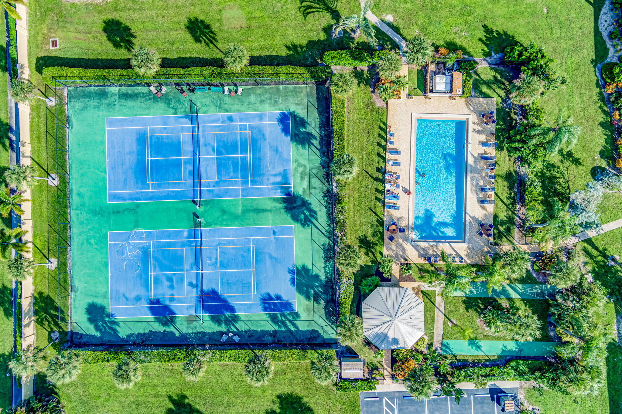 1420 Ocean Way, Unit 23B Jupiter, FL 33477 - Photo 33 of 37 a view of a garden with a fountain