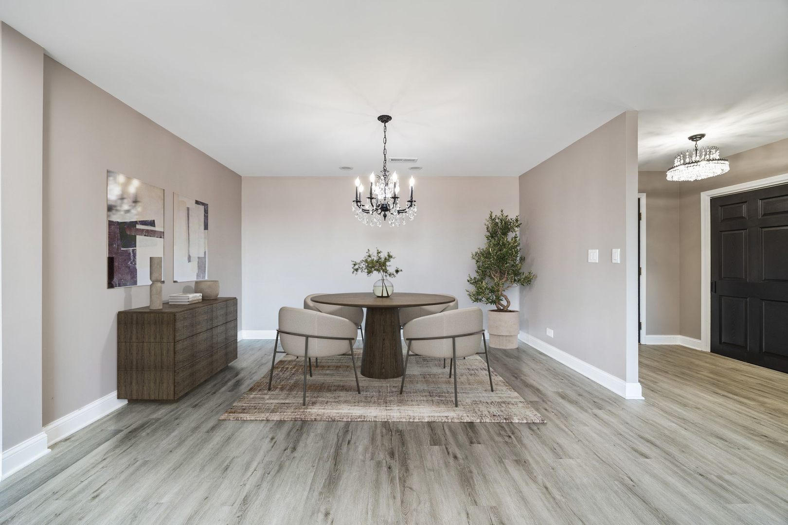 7730 Dempster Street, Unit 406 Morton Grove, IL 60053 - Photo 8 of 32 a view of a dining room with furniture and wooden floor