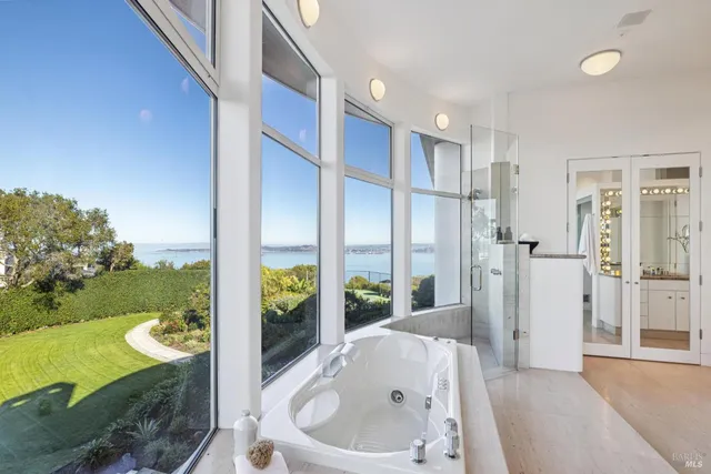 a bathroom with a tub and a sink