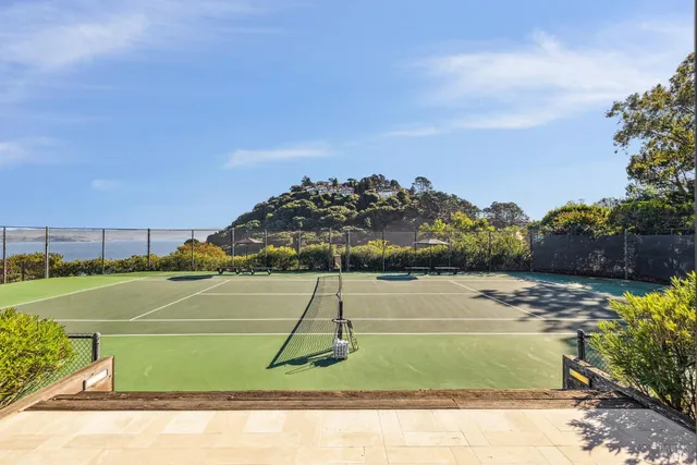 a front view of house with yard and outdoor seating