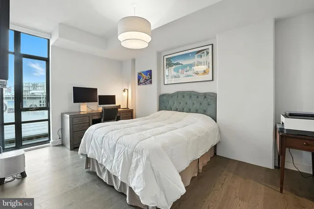 a bathroom with a sink vanity and toilet
