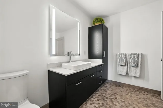 a bathroom with a shower and a bath tub