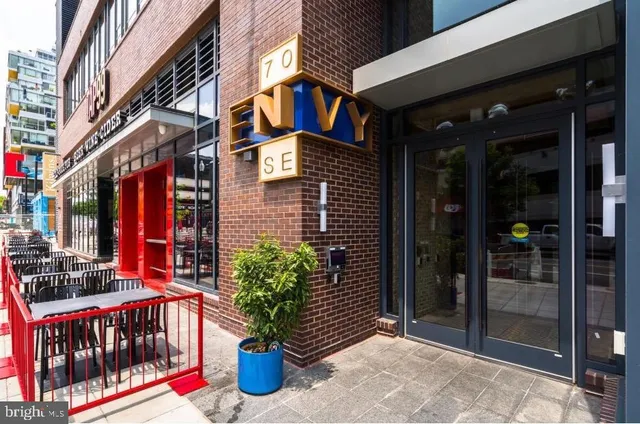 a building view with tall buildings and a street