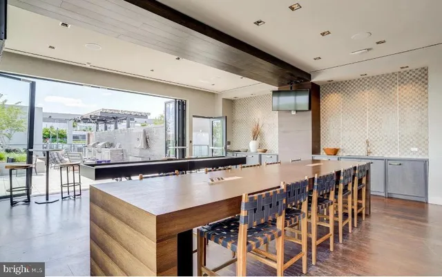 a view of a terrace with sitting area