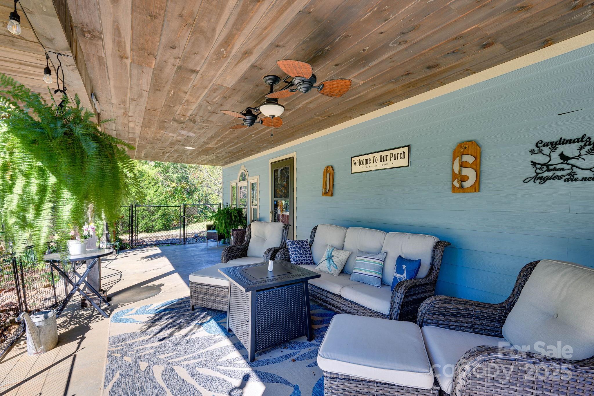 1390 Piney Knob Road Rutherfordton, NC 28139 - Photo 3 of 31 a outdoor living space with furniture and a couch