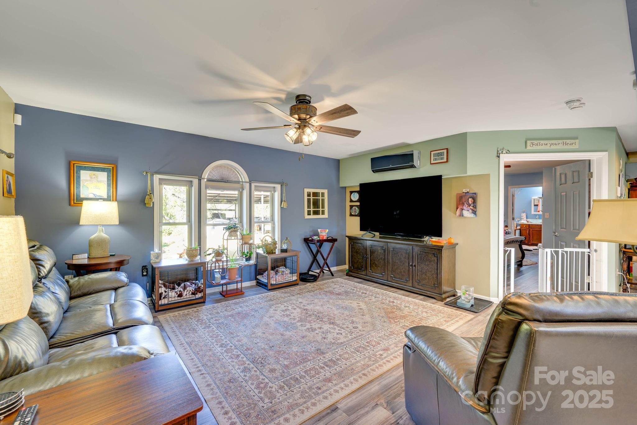 1390 Piney Knob Road Rutherfordton, NC 28139 - Photo 5 of 31 a living room with furniture and a flat screen tv
