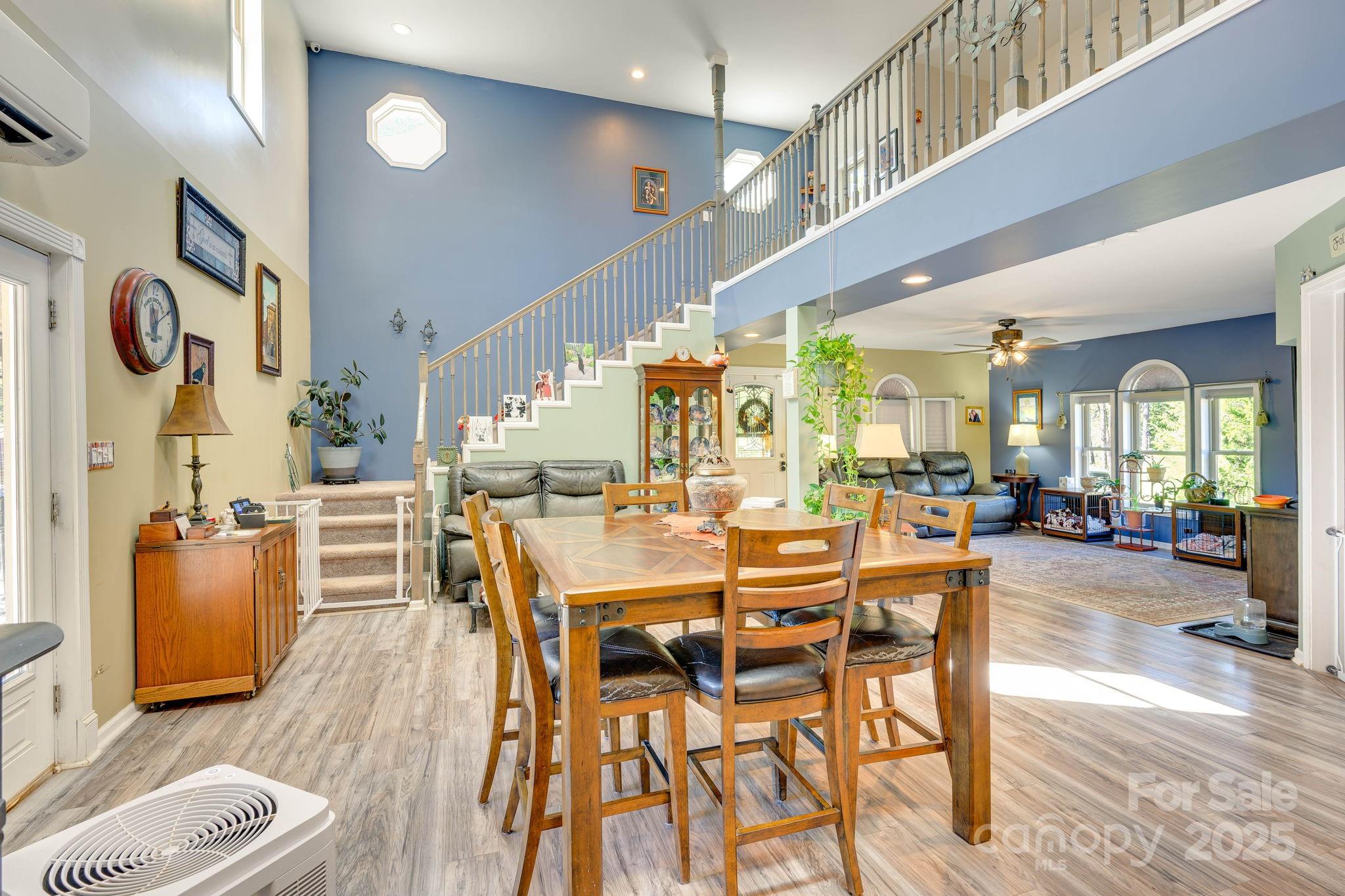 1390 Piney Knob Road Rutherfordton, NC 28139 - Photo 6 of 31 a view of a dining room with furniture and wooden floor