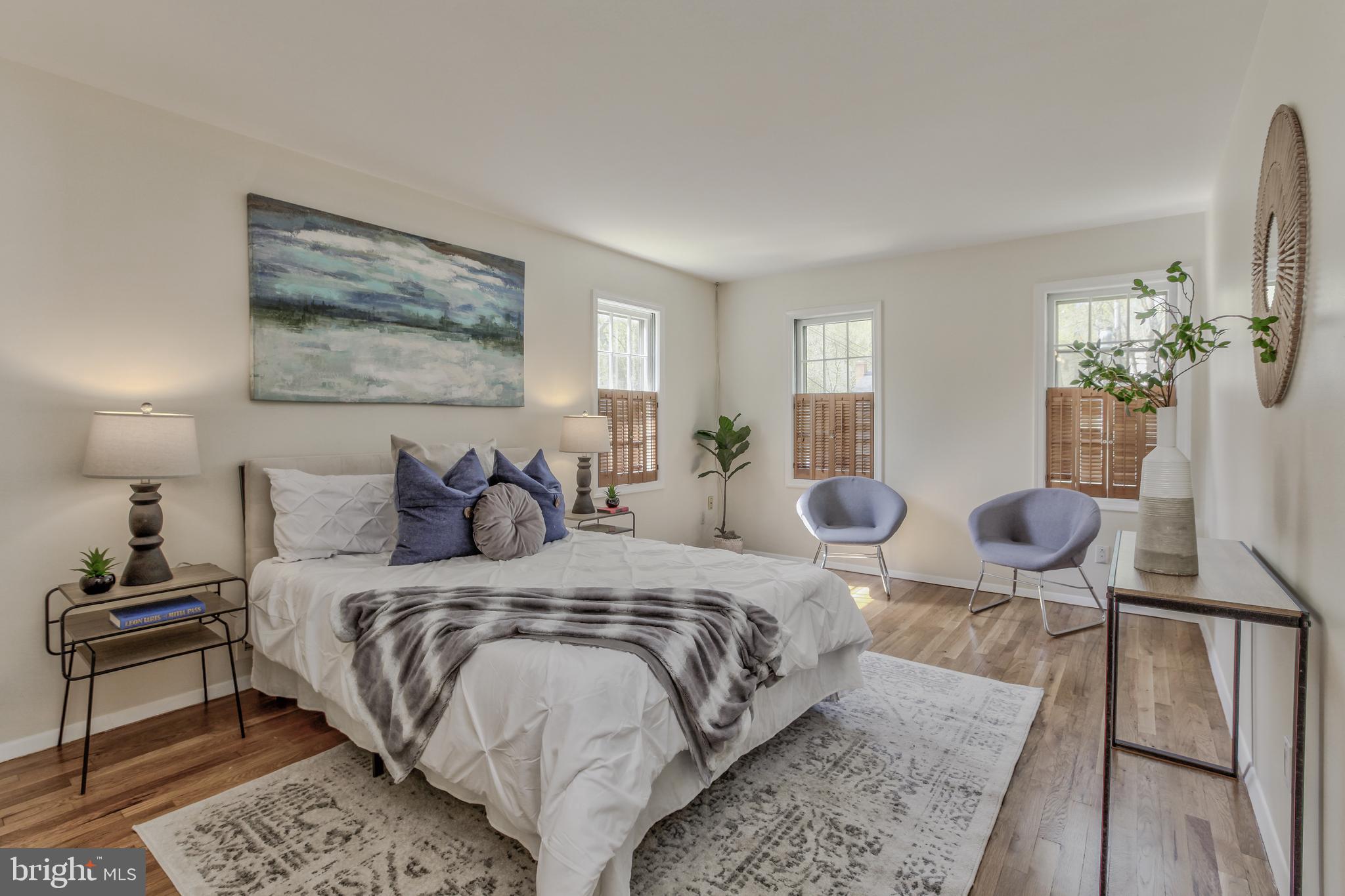 14112 Flint Rock Road Rockville, MD 20853 - Photo 25 of 52 a bedroom with double bed and a couch