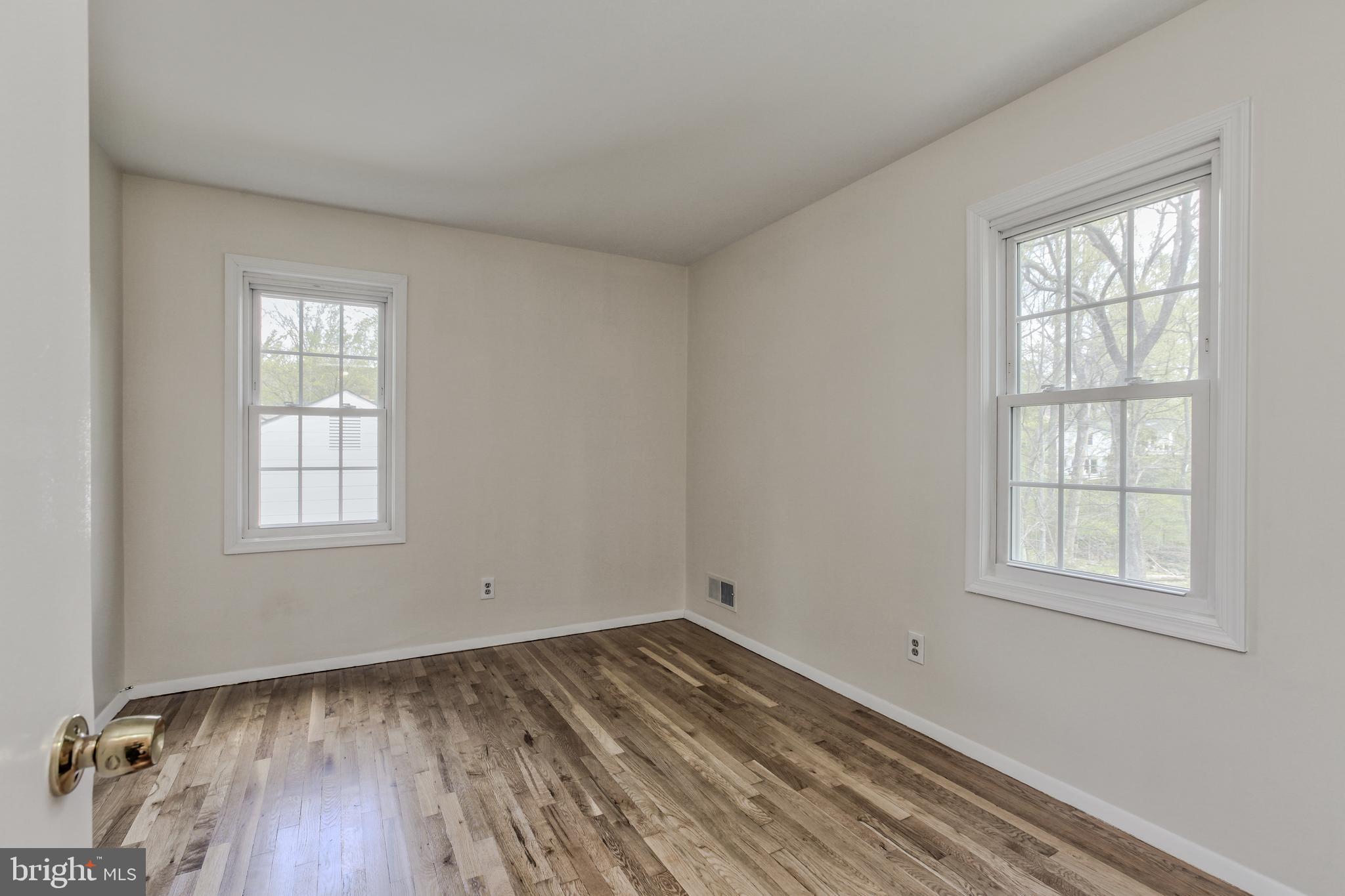 14112 Flint Rock Road Rockville, MD 20853 - Photo 32 of 52 an empty room with a window