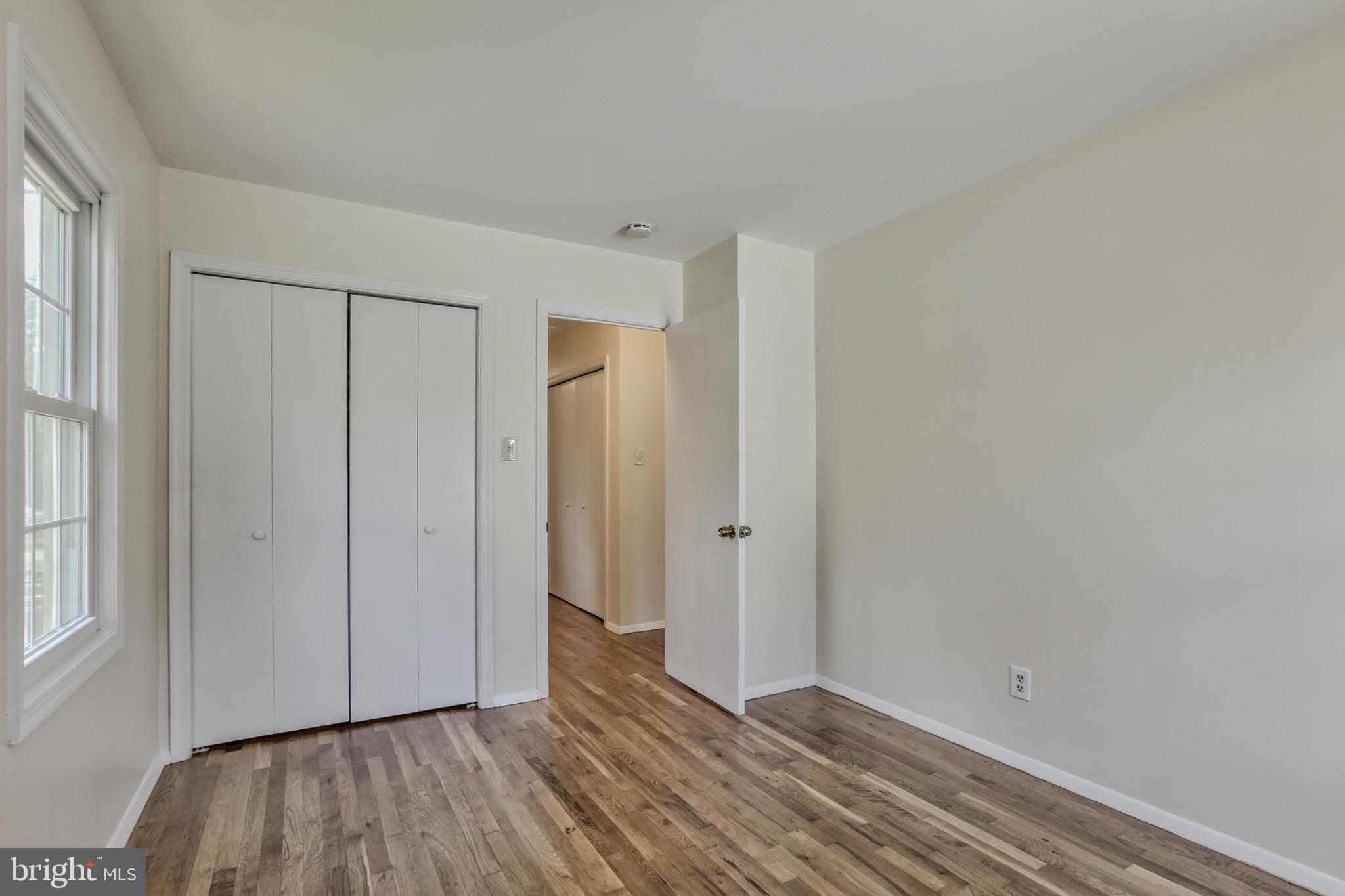 14112 Flint Rock Road Rockville, MD 20853 - Photo 33 of 52 a view of an empty room and wooden floor
