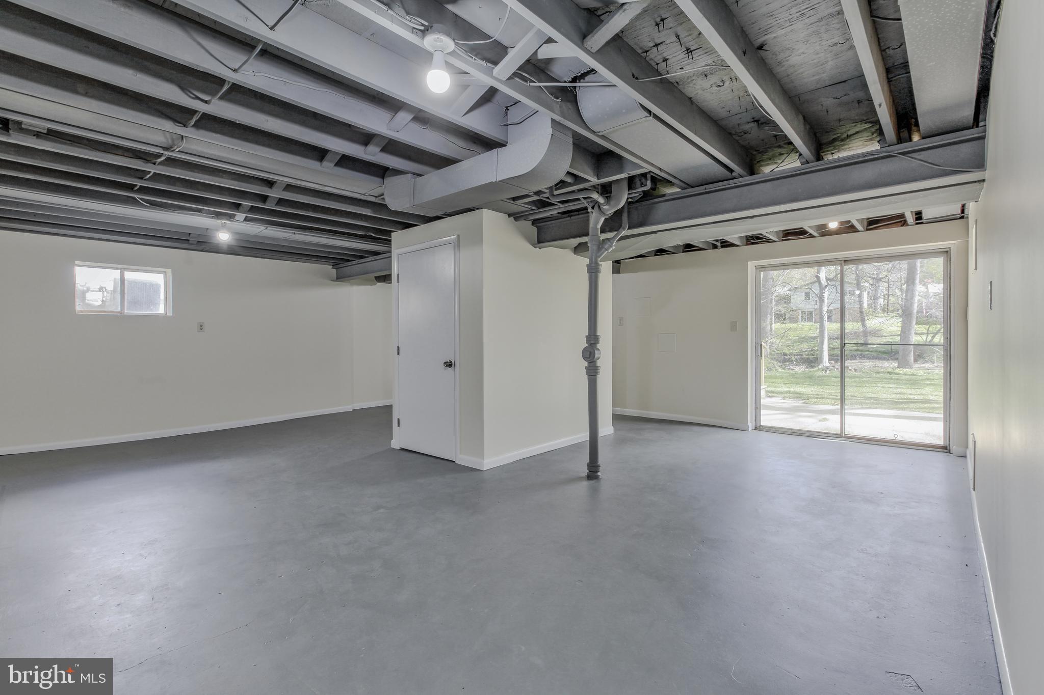 14112 Flint Rock Road Rockville, MD 20853 - Photo 41 of 52 a view of empty room with wooden walls