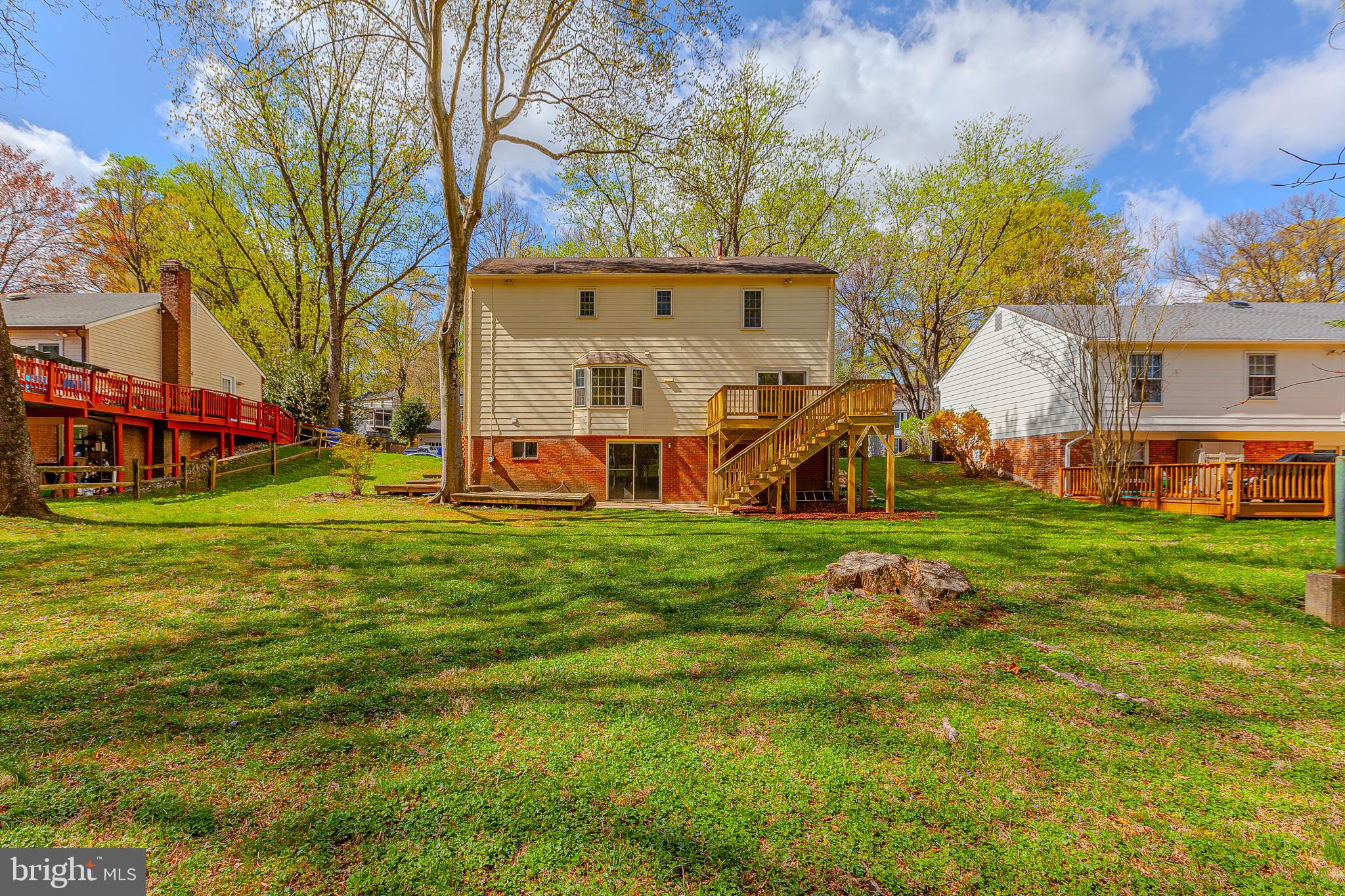14112 Flint Rock Road Rockville, MD 20853 - Photo 50 of 52 a view of a house with a big yard and large trees