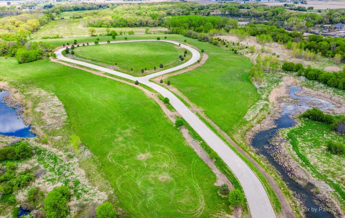4006 Riverside Drive Johnsburg, IL 60051 - Photo 21 of 29 a view of a green filed