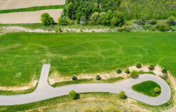 a close up of a sink and a yard