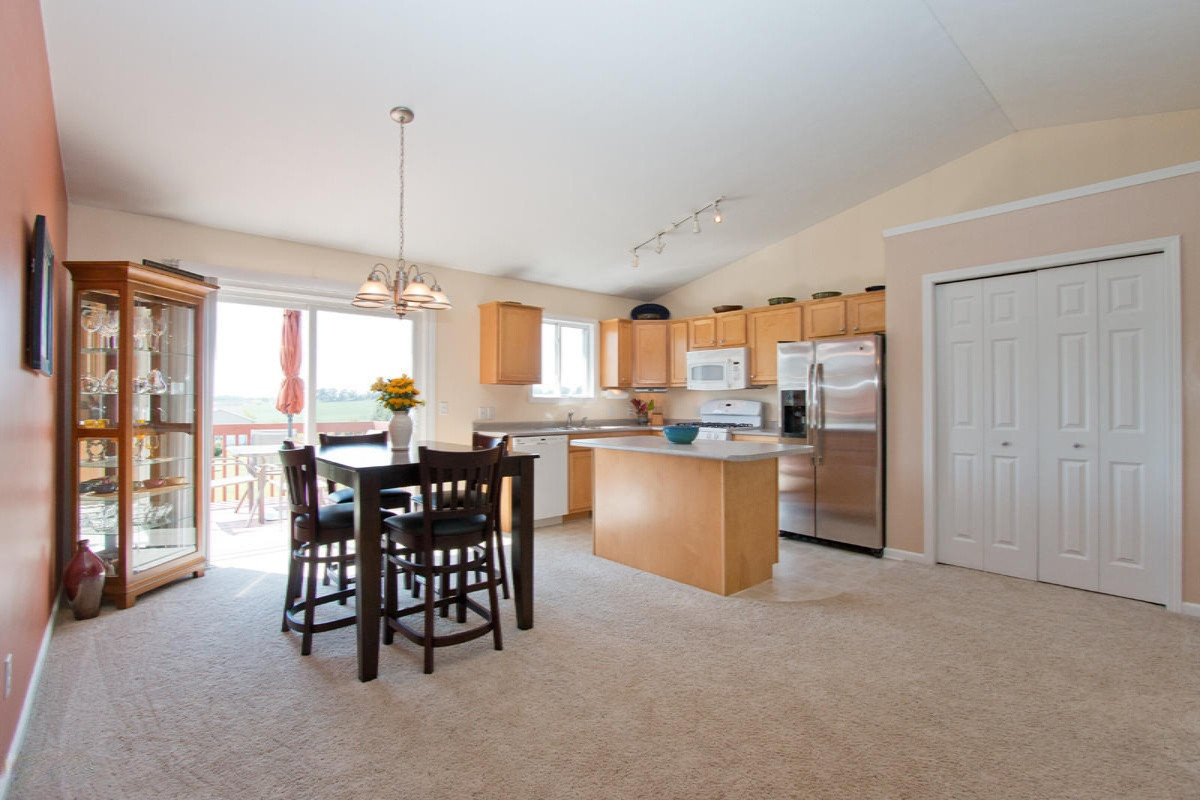 8262 Tucker Road Clarksville, MI 48815 - Photo 5 of 15 010 dining room and kitchen - IMG_7624